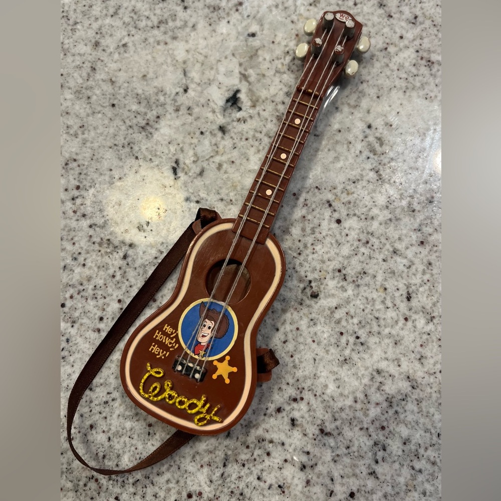 Vintage Y2K Toy Story woody guitar toy